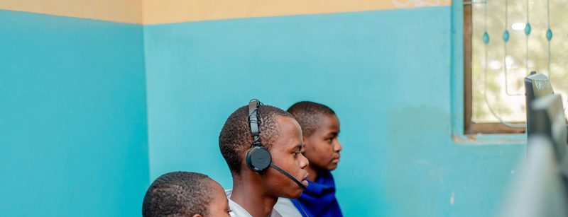 Youth participants engaged in a Digital Economy Africa learning activity